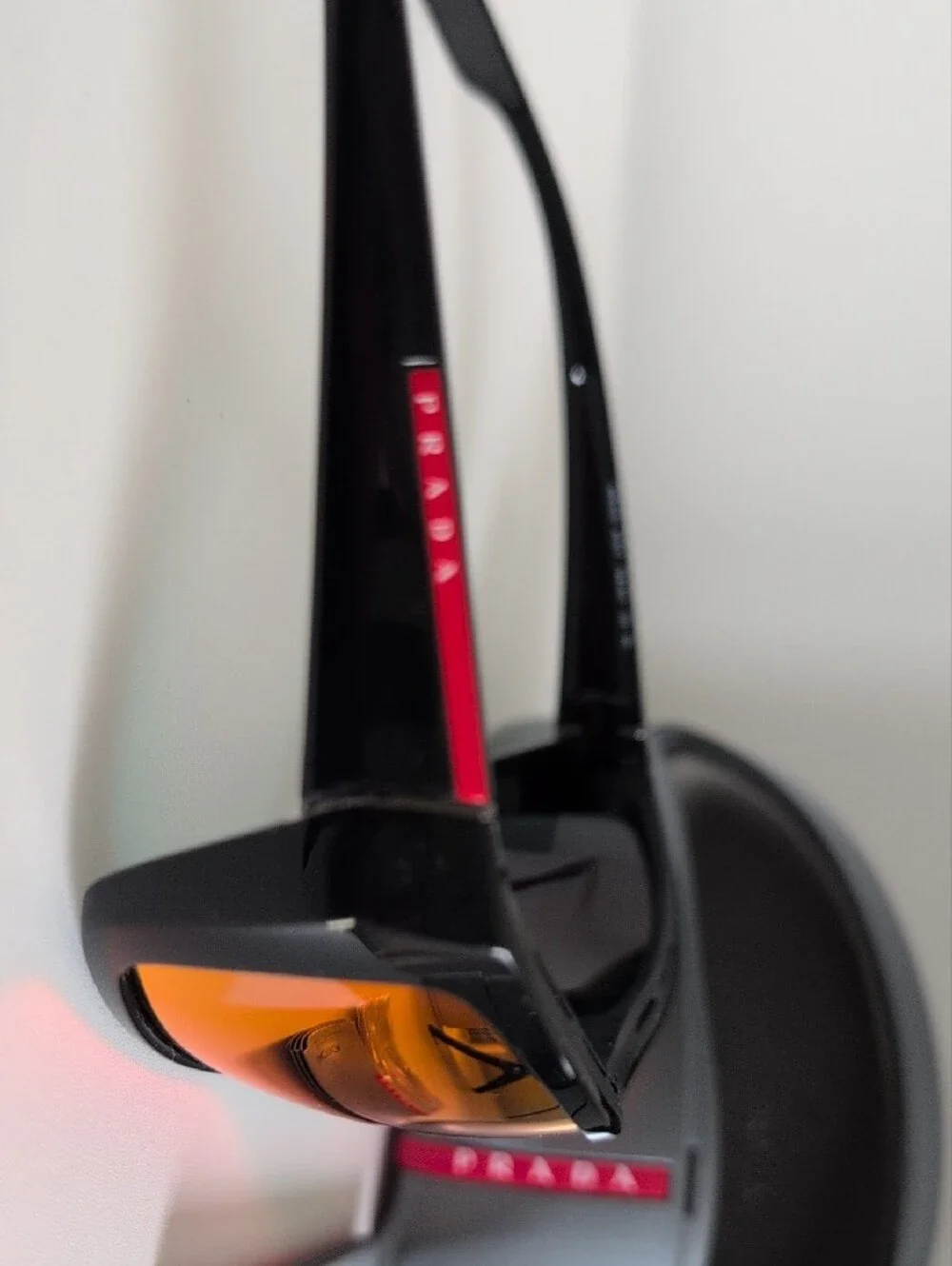 Prada Black Sunglasses with Red-Orange Mirrored Lenses